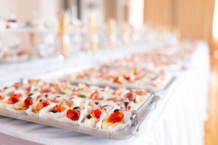 Close up of various canapes served in plate on buffet table.の写真素材