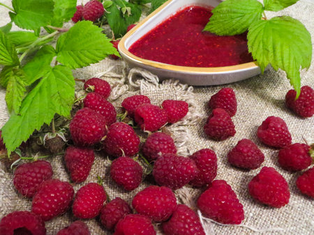Fresh raspberry and raspberry jam.の写真素材
