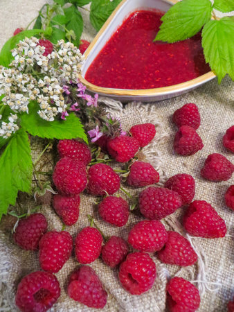 Fresh raspberry and raspberry jam.の写真素材