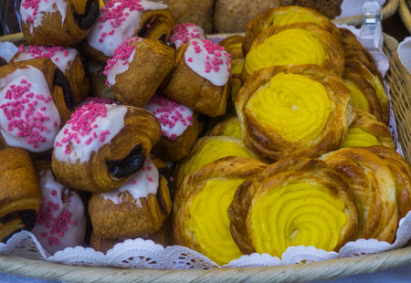 Buns with curd cream and jam, sold at the city fairの写真素材