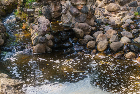 A small cascade of water on the Bastion Hill in Riga. Latvia.の写真素材