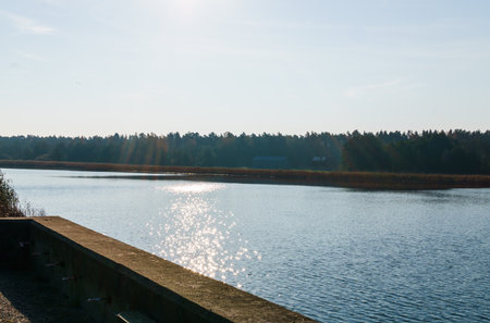 the view of the river Lielupe at autumn in Latviaの写真素材