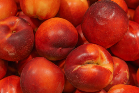 Fresh, ripe, juicy peaches in a box.の写真素材