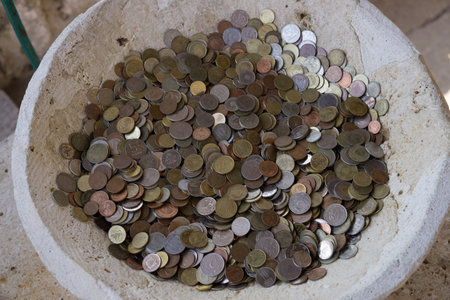 Donation bowl with money. Collection, Virgin Mary Monastery on the reef. Montenegro, Bay of Kotor, September 2018の写真素材