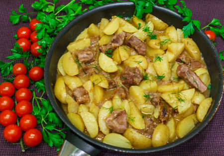 Fresh veal, stewed with potatoes at homeの写真素材