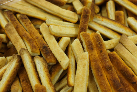 Fresh, chopped, cookies made in the form of chopsticksの写真素材
