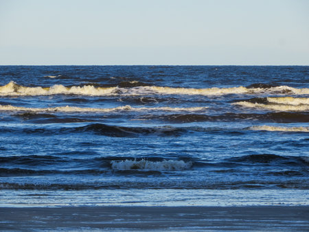 Big waves with white foam of the Gulf of Riga