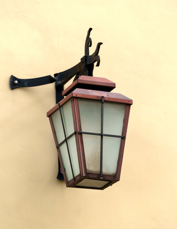 Lamps on the wall of the house, stylized antiqueの写真素材