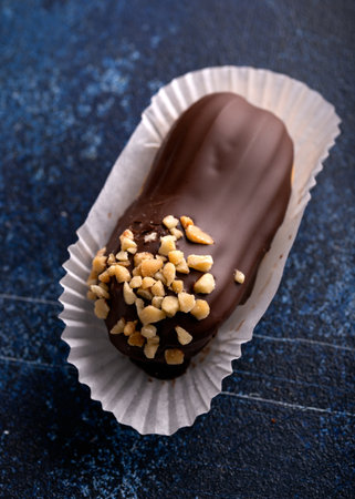Beautiful delicious French chocolate eclairs with custard