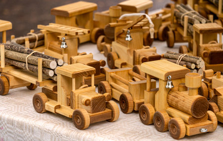 Handmade wooden cars on wheels at the fair.の写真素材