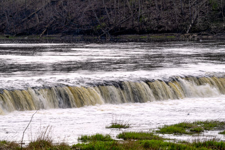 The longest waterfall in Europe. In Latvia, the city of Kuldiga.の写真素材