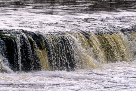 The longest waterfall in Europe. In Latvia, the city of Kuldigaの写真素材
