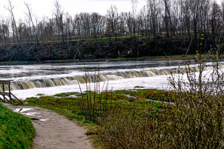 The longest waterfall in Europe. In Latvia, the city of Kuldiga.の写真素材