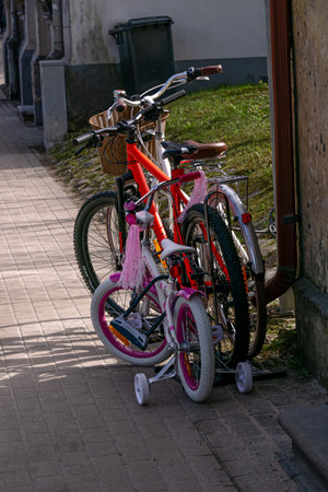 A family set of three bicycles awaiting their owners