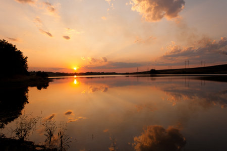 descending colorful sunset in Bulgariaの写真素材