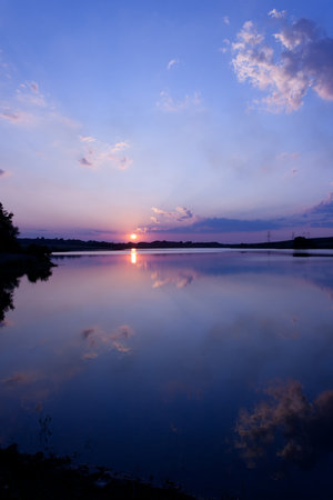 descending colorful sunset in Bulgariaの写真素材