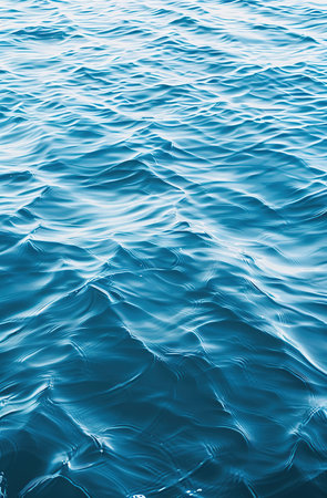 Blue sea water surface with waves and ripples. Abstract background.の素材