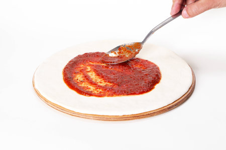 preparing a pizza