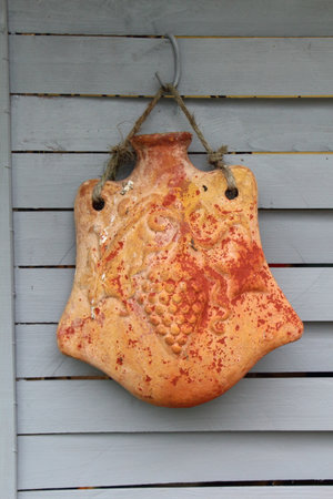 Old jar as decoration of a stockadeの写真素材