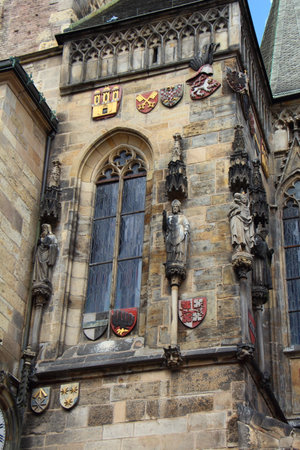 Coats of arms and statue of the ancient town hall in Pragueの写真素材