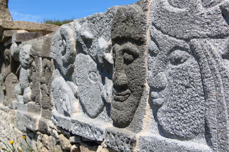 PLOUGUERNEAU, FRANCE - JULY 06: Faces of a granite fresco in Plouguerneau, july 06, 2016のeditorial素材