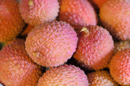Close-up of a heap of pink lycheeの写真素材