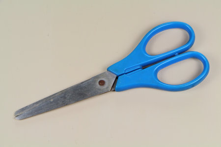 Pair of blue closed scissors for schoolchild