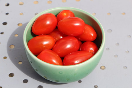Cherry tomatoes in a bowl as appetizerの写真素材