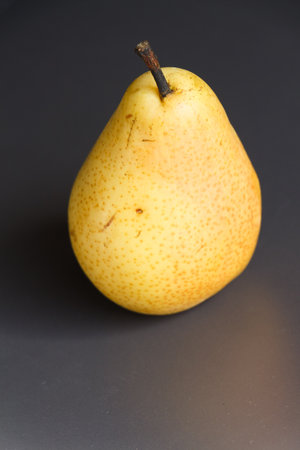 Yellow williams pear on a gray backgroundの写真素材