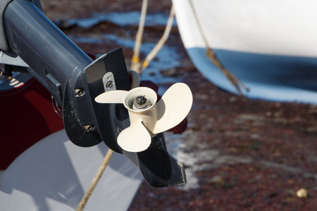 Boat motor propeller in an harbor in Brittany at low tide