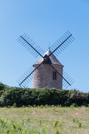 Traditional windmill made in stones in Plogoffの写真素材