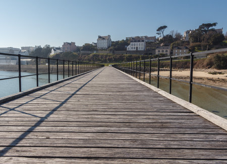 Bridge in wood and metal and beach in Audierneの写真素材