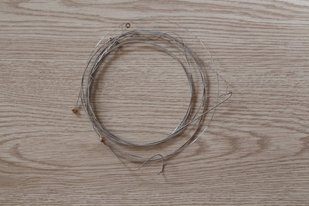 Used guitar strings winded up after change