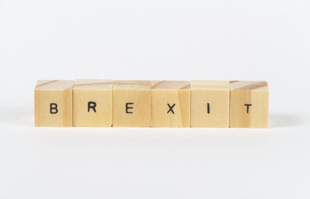 Brexit written with wooden cubes on white backgroundの写真素材