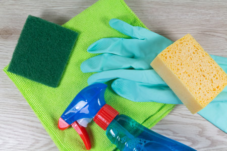 Microfiber clothes, sponge, scrub pad, spray and rubber glove