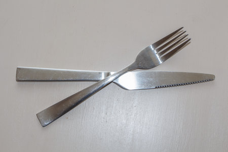 Metal fork and knife on a table