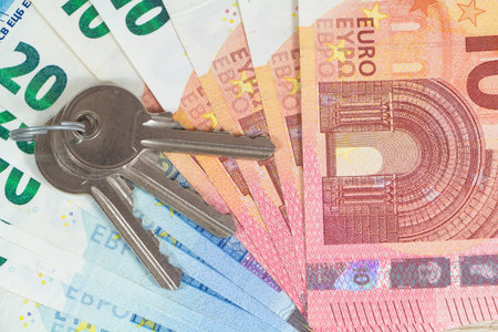 Keys and banknotes of ten and twenty eurosの写真素材