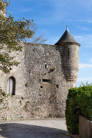 Tower in the ramparts of Mont Saint-Michel against blue skyのeditorial素材