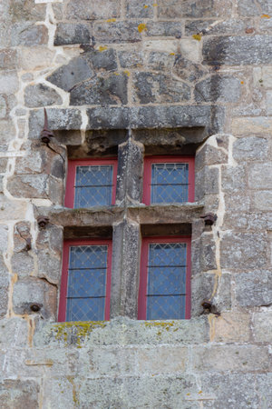 Old window in the wall of a medieval castleのeditorial素材