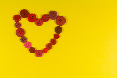 Red heart made in buttons for Valentine's dayの写真素材
