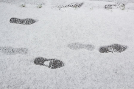 Footprints on snow in Brittany during winterの写真素材