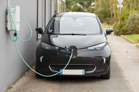 DOUARNENEZ - FRANCE, SEPTEMBER 12 2017 : Charging electric car in the street