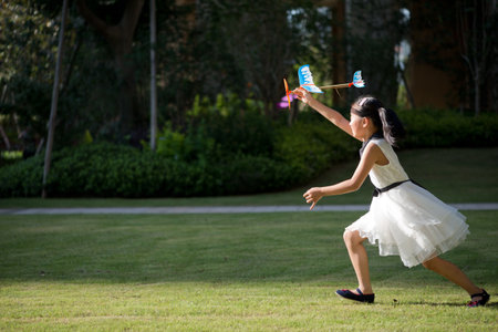 Little girl and aircraftの写真素材