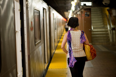 Young woman waiting for the trainのeditorial素材