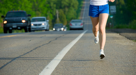 Asian woman active in forest  running  Girl running at great speed  