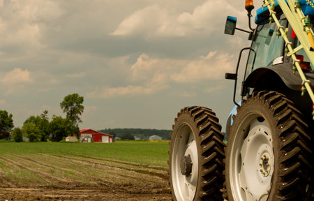 Tractor on the road with trailer 