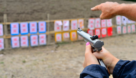 Woman Shooter at the Shooting Range
