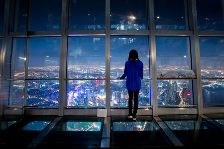 overlooking shanghai at night from shanghai world financial centerのeditorial素材