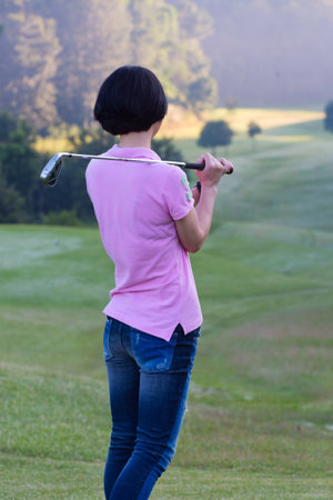 Footprint on golf in frosty fieldの写真素材