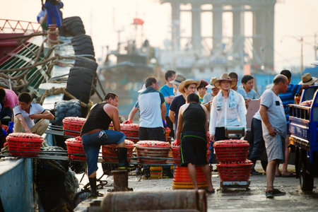 Fishermen fish market transactionsのeditorial素材